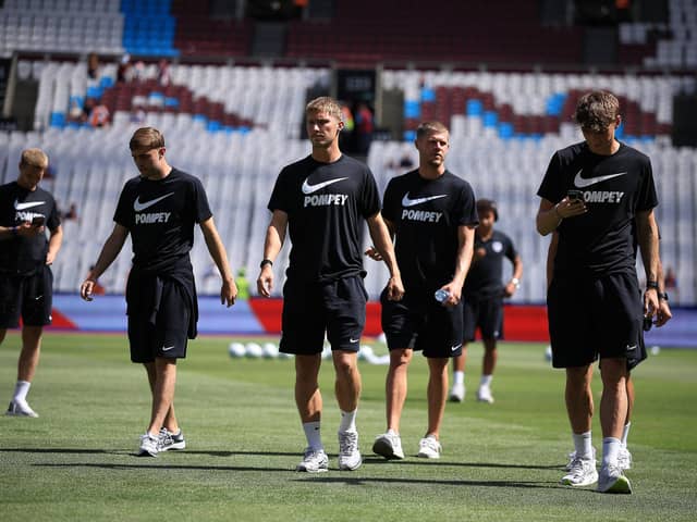 Pompey arrive at the London Stadium