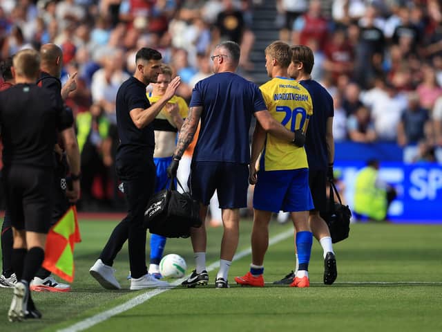 Pompey striker Thomas Waddingaham is forced off at West Ham. Pic: Chris Foxwell/ProSportsImages