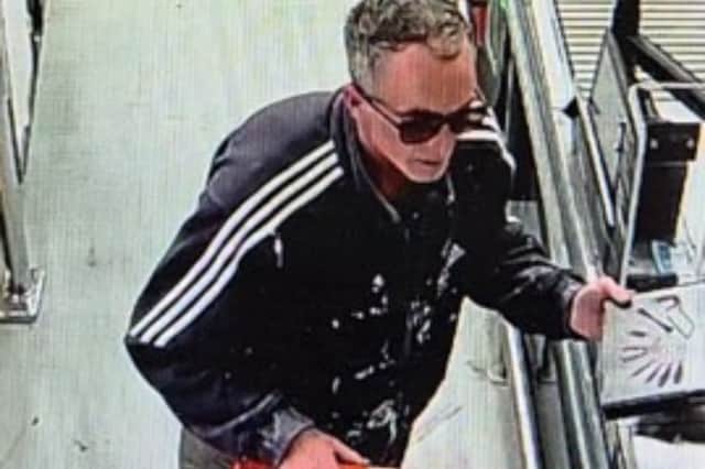 Police seek to identify this man after a male grabbed a woman and hurled abuse at them while trying to steal an angle grinder from B&Q in Titchfield.