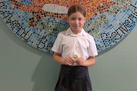 Eowyn Hill, a pupil at Grange Junior School, nine, has received a special prize for raising money for the Royal Navy charity Aggies.