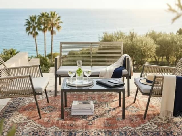   Wowcher’s £199 four-seater rattan garden furniture set includes two chairs, a loveseat and glass-topped table.  