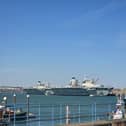 HMS Prince of Wales and HMS Queen Elizabeth alongside HMNB Portsmouth.