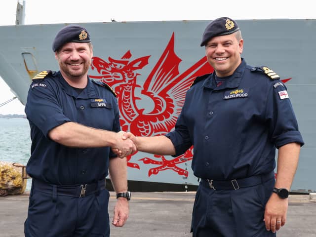 Commander Giffin hands over the role of Commanding Officer to Commander Hazelwood in Mombasa, Kenya.