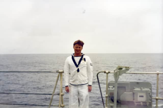 Pictured is: Andrew Rossiter aged 26 on board HMS Bristol, just after receiving his second campaign medal for serving in the Gulf during the Iraq war.