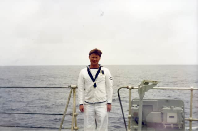 Pictured is: Andrew Rossiter aged 26 on board HMS Bristol, just after receiving his second campaign medal for serving in the Gulf during the Iraq war.
