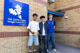 Joshua Pereira, 17, Daniel Ashanti, 18, and 
Matthew Hordell, 18, celebrate their A-level results at Oaklands Catholic Sixth Form College in Waterlooville.
