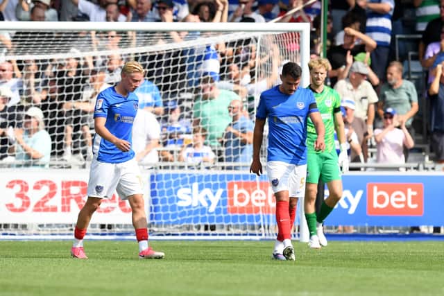 Rocco Shein, Regan Poole and Nicolas Schmid are dejected after conceding against QPR. Picture: Jeff Mood/ProSportsImages