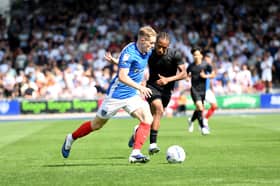 Gaffer For a Day George Hare named Terry Devlin has his man of the match against QPR. Picture: Jeff Mood/ProSportsImages