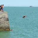 Children and adults were seen tombstoning off the Round Tower and the Hot Walls in Old Portsmouth, on Monday, August 17, 2026.