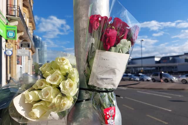 Flowers have been left at the scene of a bus crash at The Hard after it was confirmed that a 14-year-old boy died from his injuries.