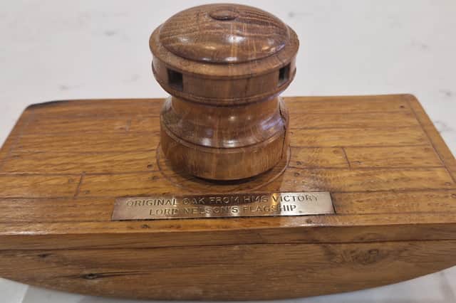 Kevin Fitzpatrick is looking to contact a skilled craftsman who made an ink blotter and napkin rings for his family, all made from the original wood of HMS VIctory.