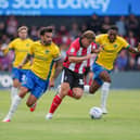Marlon Pack provided another example of why he remains prices to Pompey in the 3-1 win at Lincoln. Picture: Jason Brown