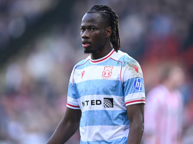 Issa Kabore is poised to rejoin Wrexham from Manchester City