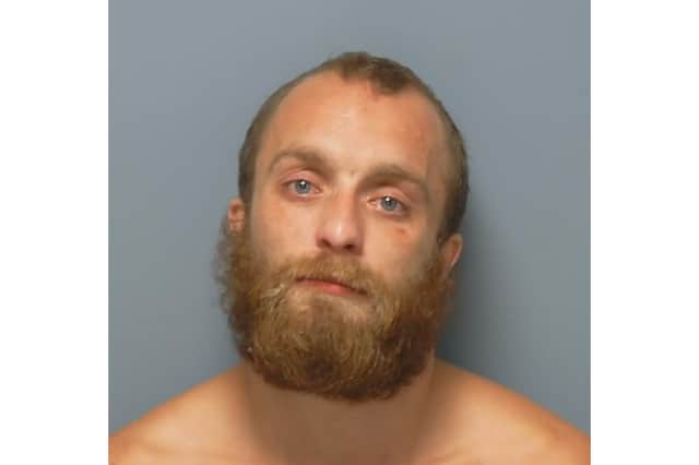 Lewis Dine is wanted by the police after failing to appear at court.