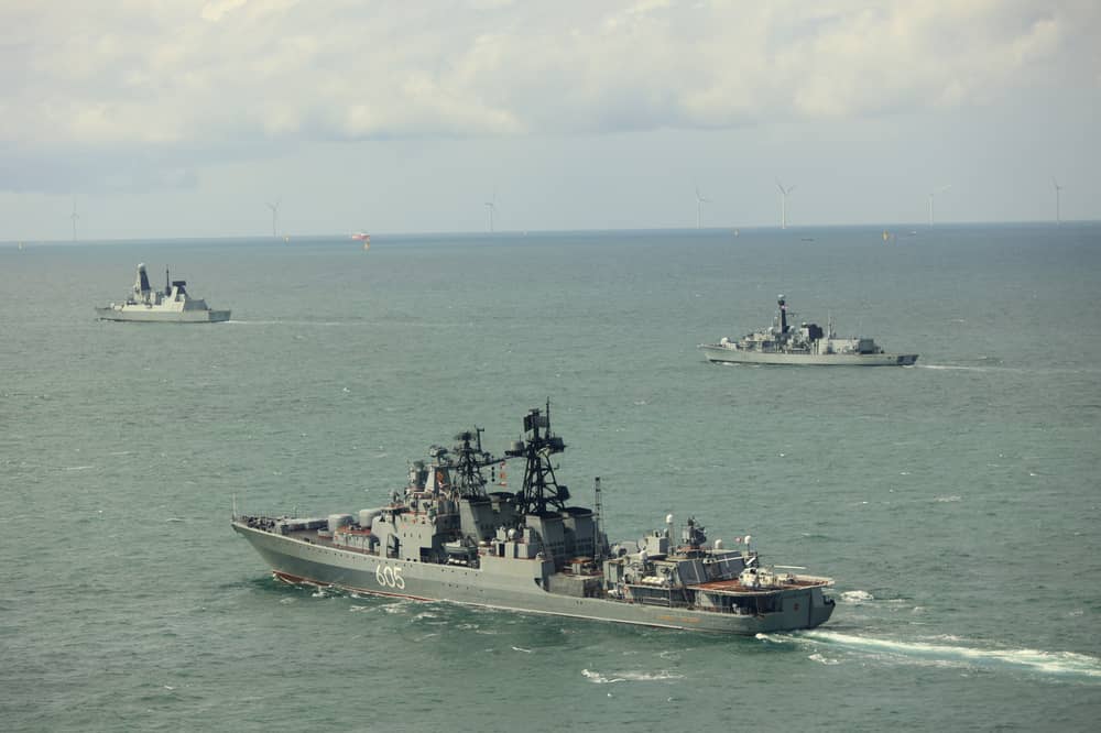 ‘Glaring’ gaps’ in the Royal Navy fleet will make the UK more vulnerable to attacks from Russia in the High North. Pictured: Admiral Levchenko with HMS Duncan (left) and HMS St Albans (right).