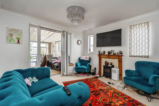 The bright and spacious lounge provides a comfortable main reception area within the bungalow's flexible layout