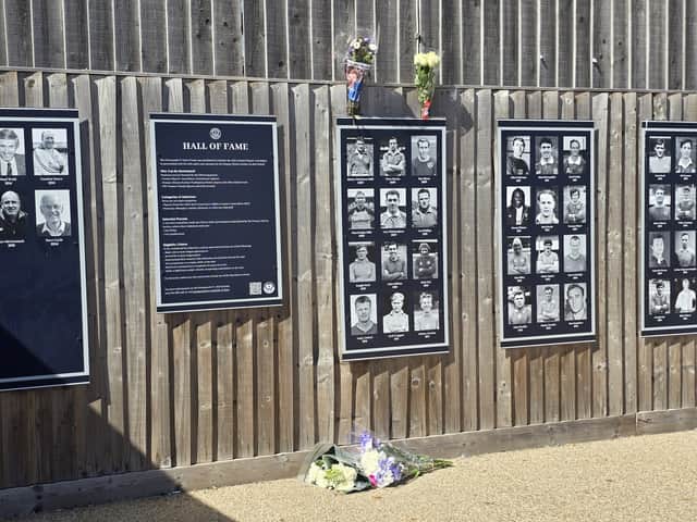 Flowers have been laid at Fratton Park next to Alan Knight's picture on the Pompey Hall of Fame.