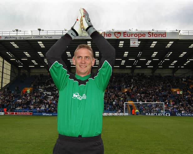 Alan Knight salutes the crowd at his testimonial game.
Picture Mick Young