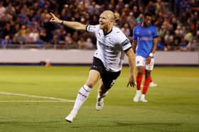 Lars Salvesen celebrates after scoring in Derby's win against Pompey at Fratton Park
