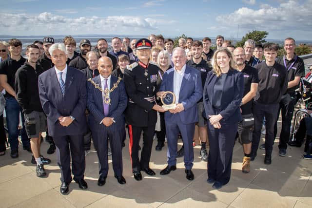 Pictured: Penny Mordaunt, Lord-Lieutenant of Hampshire, Nigel Atkinson presenting the award to Sean Codling, owner and MD of CTS Europe, Lord Mayor Abdul Kadir and Khalid Aziz - Hampshire Deputy Lieutenant with staff at CTS House, Cosham, Portsmouth