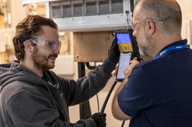 A City of Portsmouth College student receives training from a lecturer in
Refrigeration and Air Conditioning