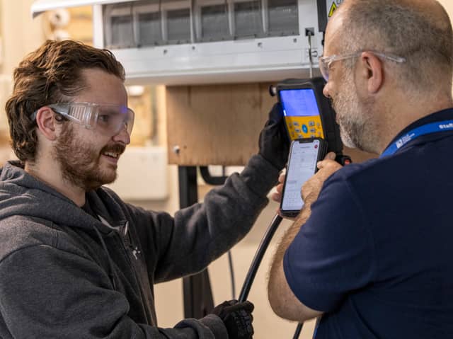 A City of Portsmouth College student receives training from a lecturer in
Refrigeration and Air Conditioning