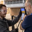 A City of Portsmouth College student receives training from a lecturer in
Refrigeration and Air Conditioning