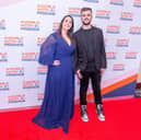 Lewis Hine, right, with mum Emma Hine on A World With Friends' red carpet in 2022.