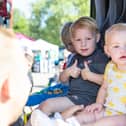 Rudy and Dolcie in the fire truck.  