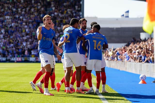 Pompey celebrate Conor Shaughnessy’s opener against Cardiff City. Picture: Jason Brown