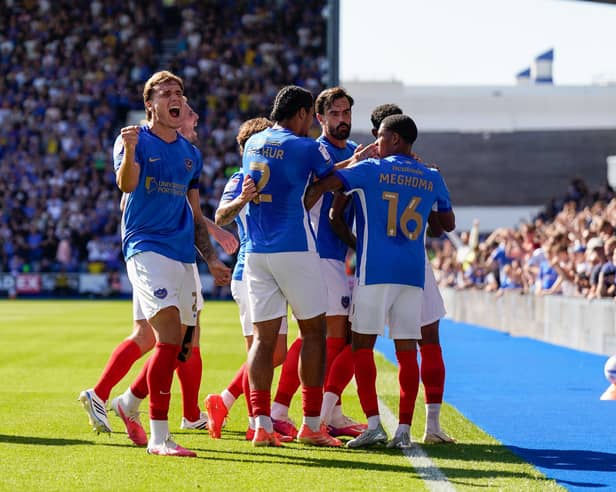 Pompey celebrate their opener against Cardiff City. Pic: Jason Brown