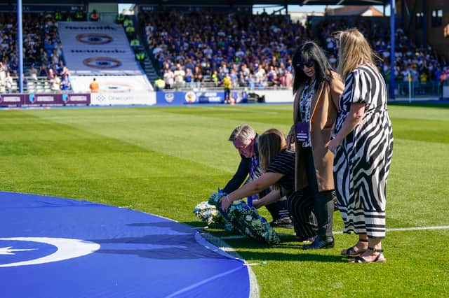Alan Knight's family and Pompey chief executive Andy Cullen lay a wreath on the Fratton Park pitch today. Pic: Jason Brown