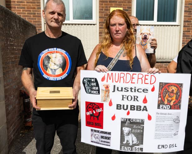 Richard Penfold with the remains of his beloved pet at the vigil for Bubba.