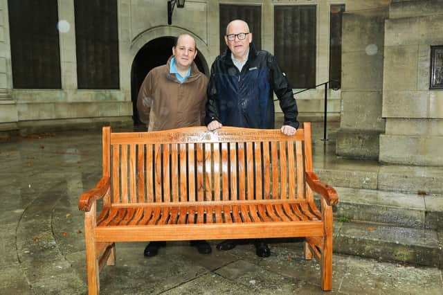 From L: Bob Beach and Gareth Lewis standing alongside one of the Pompey Pals memorial benches.