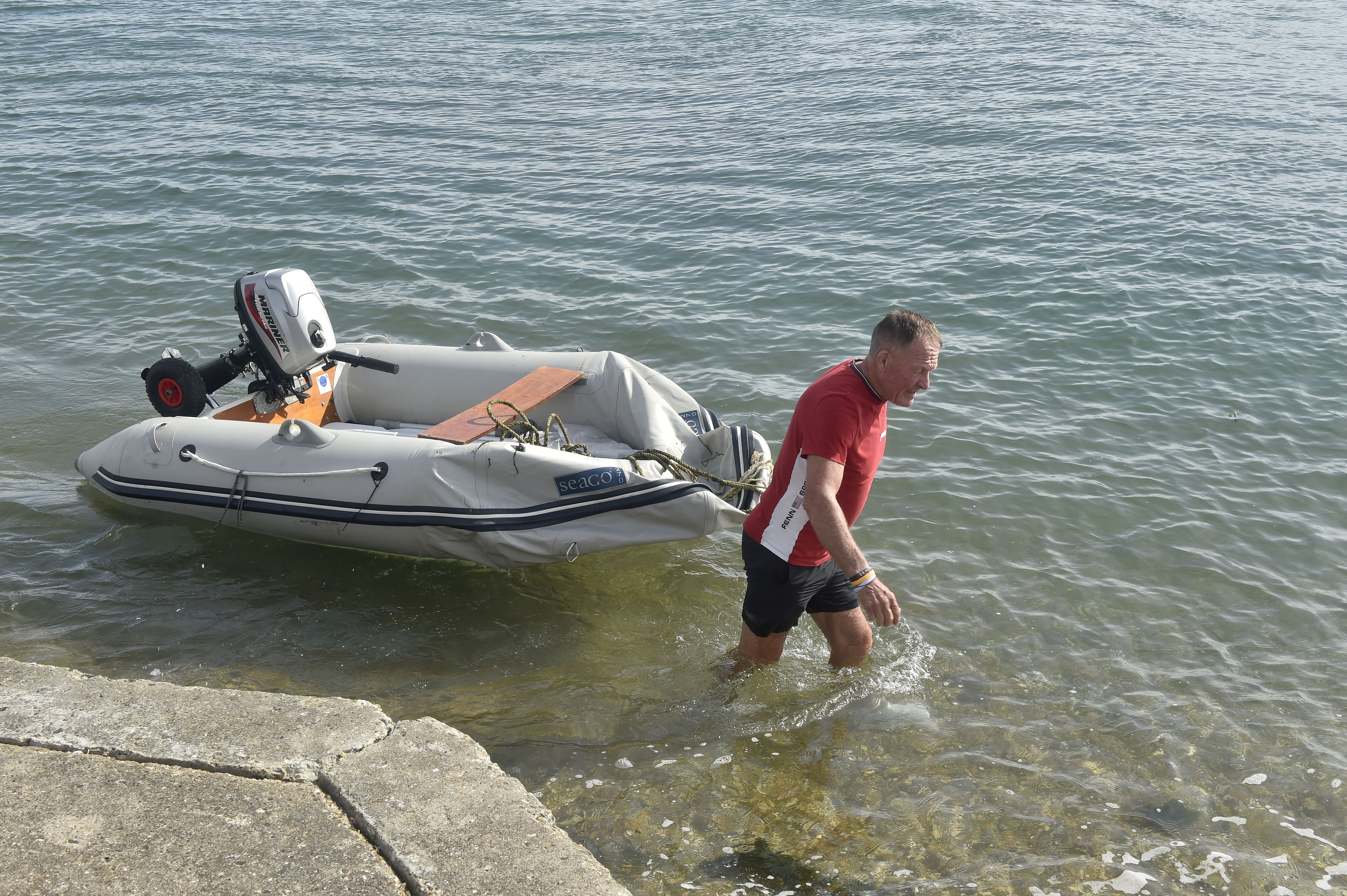 A grandfather had to deflate his own dinghy to stop "idiot" protesters taking it