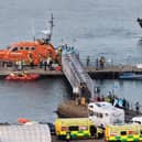 RNLI boats bring migrants ashore at Eastney on Sunday, September 6, 2026