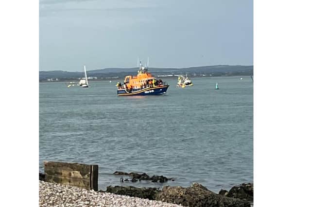 Migrants arriving in Portsmouth on small boat