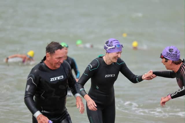 More than £2,500 has been raised for GAFIRS following a mile-long swim.