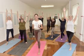 Caroline Roberts with her Tuesday morning yoga class at Crofton Community Centre.
