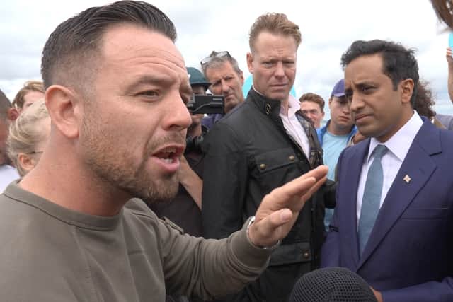 Patriot Platform founder Daniel Thomas, known as Danny Tommo speaking to Reform UK home affairs spokesman Zia Yusuf in Portsmouth
