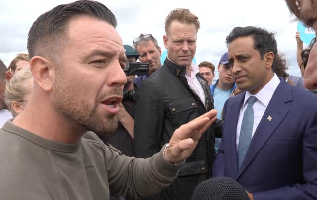Patriot Platform founder Daniel Thomas, known as Danny Tommo speaking to Reform UK home affairs spokesman Zia Yusuf in Portsmouth
