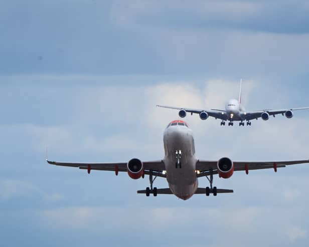 Passenger planes depart and arrive at Gatwick Airport in Crawley, West Sussex, during disruption after a system issue hit Nats (Gareth Fuller/PA)