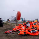Discarded life jackets at Eastney Point, near Eastney Beach, Portsmouth, following a protest after people thought to be migrants were brought into the harbour (PA)
