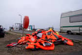 Discarded life jackets at Eastney Point, near Eastney Beach, Portsmouth, following a protest after people thought to be migrants were brought into the harbour (PA)