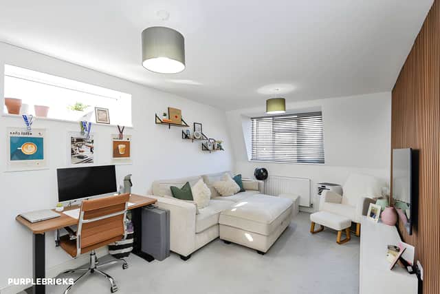 The open-plan arrangement brings the lounge, dining and kitchen areas together for flexible everyday living