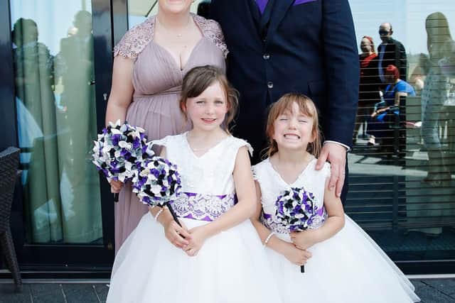 Pictured: Lee (right) with wife, Danielle, (left) and their two children.