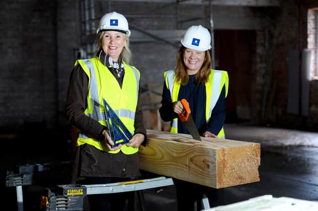 From L: Caroline Dinenage, MP for Gosport, and Councillor Zoe Huggins, leader of Gosport Borough Council, trying their hand at woodwork at the Royal Navy Rum Store.