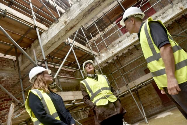 The preliminary works have finished at the Royal Navy Rum Store at Victoria Quay in Gosport, and the task is now to transform the historic structure itself. Several features have already been installed to turn the former rum store into a building for businesses.

Pictured is: (l-r) Cllr. Zoe Huggins, leader of Gosport Borough Council, Ben Mason, business development director at UK Docks and Caroline Dinenage MP for Gosport.

Picture: Sarah Standing (170926-7705)