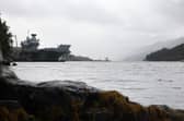 HMS Queen Elizabeth alongside Glen Mallan before heading to Edinburgh.