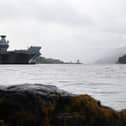 HMS Queen Elizabeth alongside Glen Mallan before heading to Edinburgh.